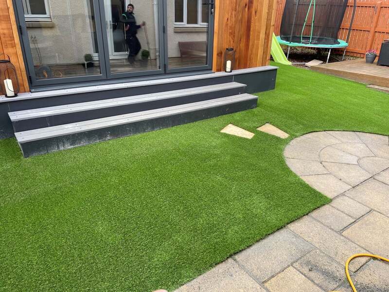 Back garden artificial grass installation in East Lothian by Planet Grass, click here for prices